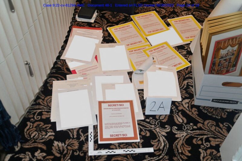 Folders and papers scattered on floor